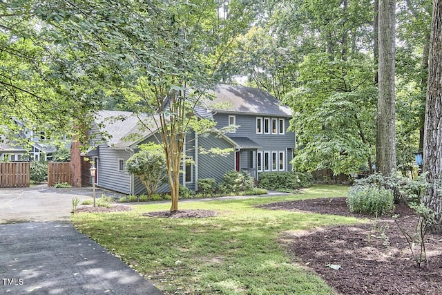 2334 Dawn Trl, Durham, NC 27712 - view of front of property with asphalt driveway