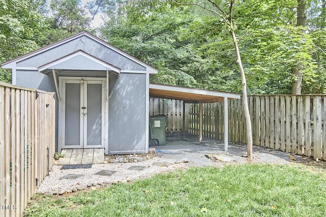 2334 Dawn Trl, Durham, NC 27712 - view of shed with a fenced backyard
