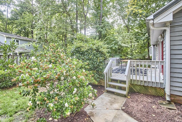 2334 Dawn Trl, Durham, NC 27712 - view of yard with a wooden deck and view of scattered trees