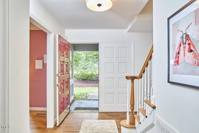 2334 Dawn Trl, Durham, NC 27712 - entryway featuring stairs and wood finished floors