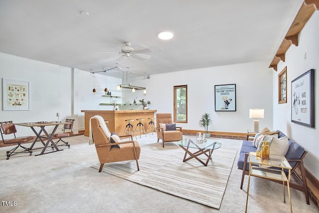 2334 Dawn Trl, Durham, NC 27712 - carpeted living area featuring a ceiling fan and baseboards