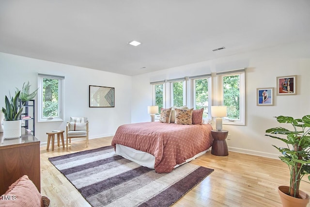 2334 Dawn Trl, Durham, NC 27712 - bedroom with light wood-style flooring and baseboards