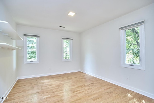 2334 Dawn Trl, Durham, NC 27712 - empty room featuring light wood-style flooring and baseboards