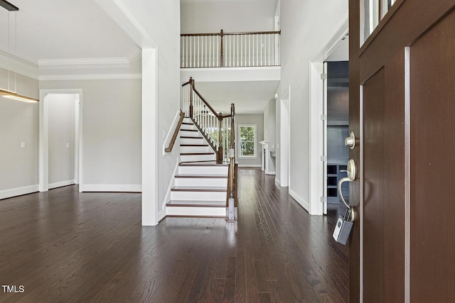 1625 Banks View Dr, Raleigh, NC 27603 - entrance foyer with stairway, dark wood-type flooring, and ornamental molding