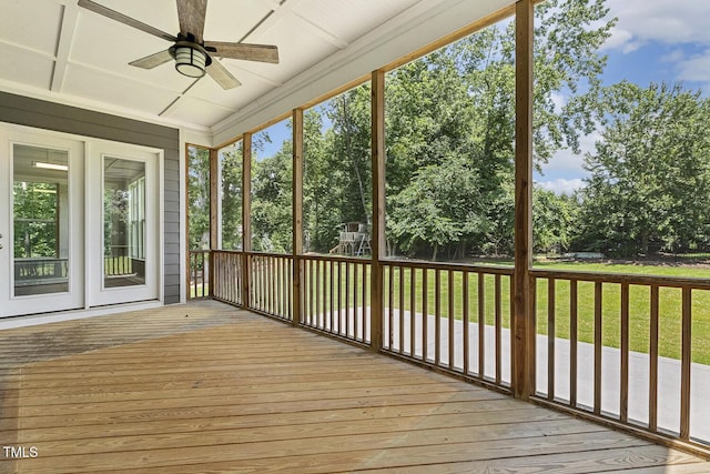 1625 Banks View Dr, Raleigh, NC 27603 - unfurnished sunroom with ceiling fan and view of scattered trees