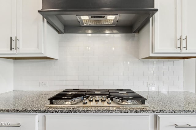 1625 Banks View Dr, Raleigh, NC 27603 - kitchen featuring ventilation hood, stainless steel gas cooktop, white cabinetry, and decorative backsplash