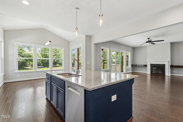 1625 Banks View Dr, Raleigh, NC 27603 - kitchen with stainless steel dishwasher, healthy amount of natural light, dark wood finished floors, light stone counters, and vaulted ceiling