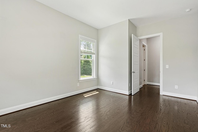 1625 Banks View Dr, Raleigh, NC 27603 - unfurnished room with dark wood-style floors and a smoke detector