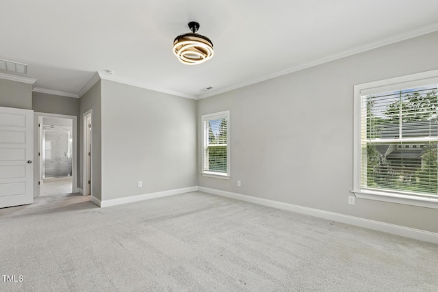 1625 Banks View Dr, Raleigh, NC 27603 - carpeted empty room featuring plenty of natural light and ornamental molding