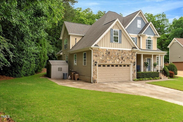 218 Kinvara Ct, Wake Forest, NC 27587 - craftsman house with stone siding, concrete driveway, a storage unit, board and batten siding, and a front yard
