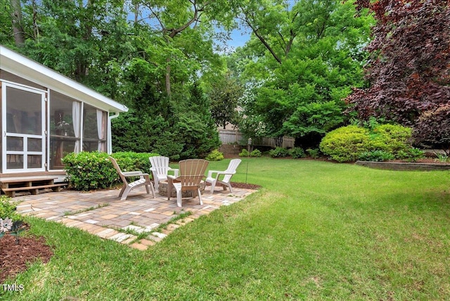 218 Kinvara Ct, Wake Forest, NC 27587 - view of yard with a patio area, a sunroom, and entry steps