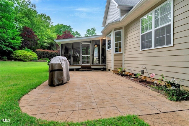 218 Kinvara Ct, Wake Forest, NC 27587 - view of patio featuring a sunroom and entry steps