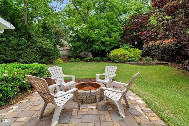 218 Kinvara Ct, Wake Forest, NC 27587 - view of patio with a fire pit