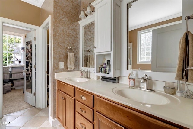 218 Kinvara Ct, Wake Forest, NC 27587 - full bathroom featuring ornamental molding, double vanity, tile patterned floors, and a spacious closet