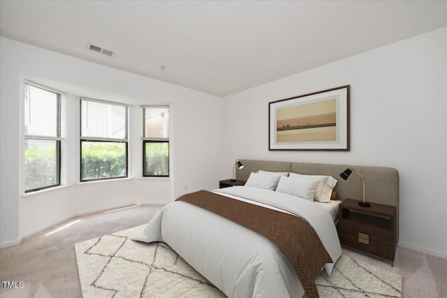 600 Audubon Lake Dr Unit 4B11, Durham, NC 27713 - bedroom with light carpet and baseboards