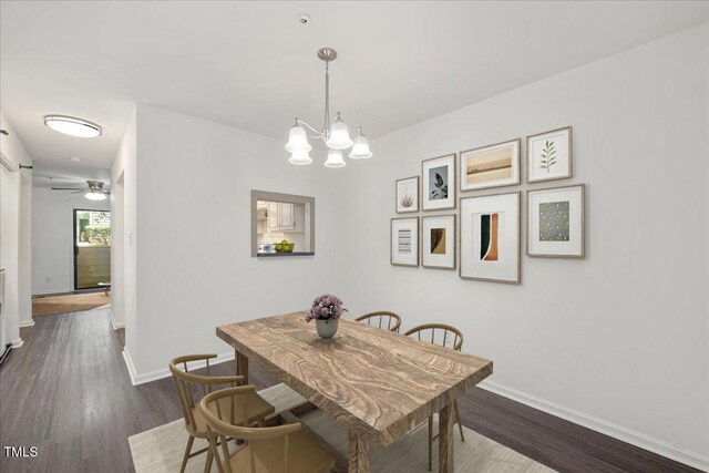 600 Audubon Lake Dr Unit 4B11, Durham, NC 27713 - dining area with dark wood-style flooring and a chandelier