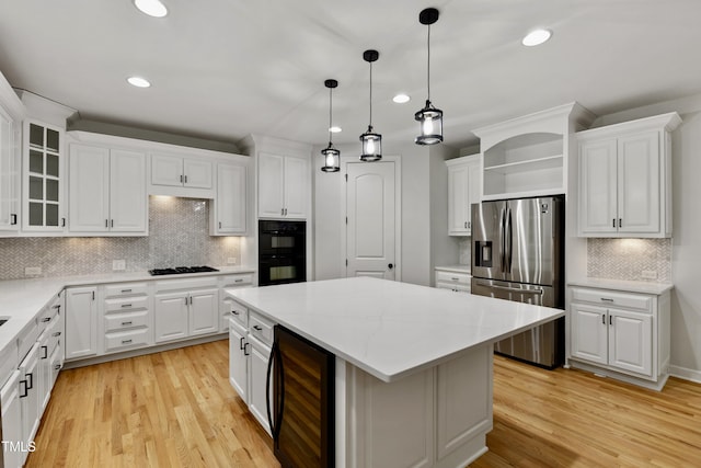 109 Aspenridge Dr, Holly Springs, NC 27540 - kitchen with black appliances, beverage cooler, open shelves, white cabinetry, and recessed lighting