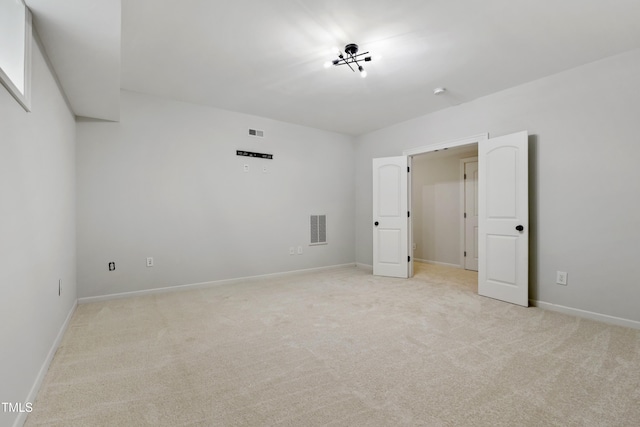 109 Aspenridge Dr, Holly Springs, NC 27540 - unfurnished bedroom with light colored carpet
