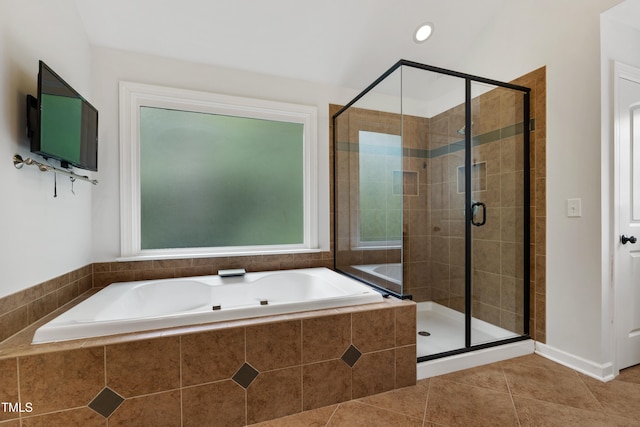 109 Aspenridge Dr, Holly Springs, NC 27540 - full bath with a garden tub, a stall shower, and tile patterned floors