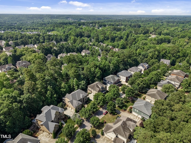 109 Aspenridge Dr, Holly Springs, NC 27540 - aerial perspective of suburban area with a heavily wooded area