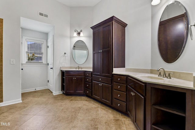 109 Aspenridge Dr, Holly Springs, NC 27540 - full bathroom with double vanity and tile patterned flooring