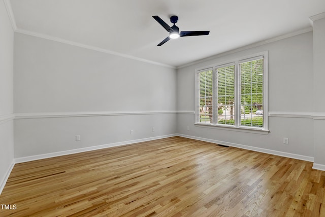 109 Aspenridge Dr, Holly Springs, NC 27540 - empty room featuring crown molding, wood finished floors, and ceiling fan