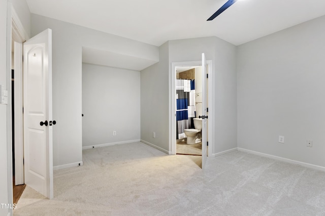 109 Aspenridge Dr, Holly Springs, NC 27540 - unfurnished bedroom featuring carpet floors, connected bathroom, and ceiling fan