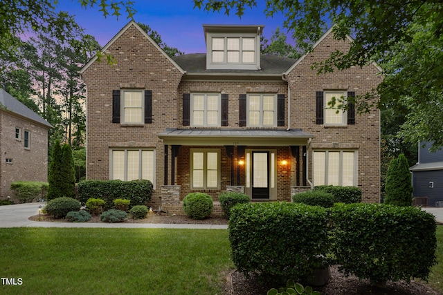 109 Aspenridge Dr, Holly Springs, NC 27540 - view of front of house with brick siding and a front yard
