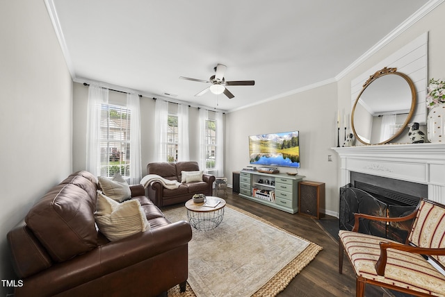 4413 Sugarbend Way, Raleigh, NC 27606 - living area featuring crown molding, ceiling fan, a fireplace with flush hearth, and dark wood-style floors