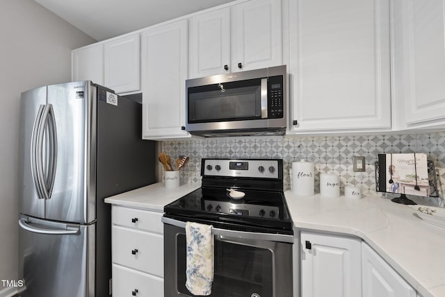 4413 Sugarbend Way, Raleigh, NC 27606 - kitchen with stainless steel appliances, white cabinetry, tasteful backsplash, and light stone counters
