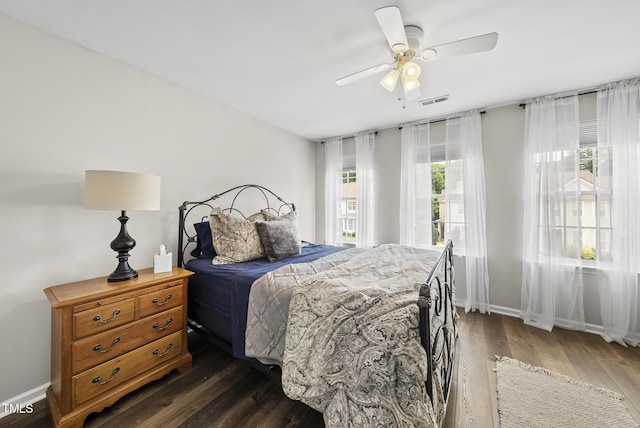 4413 Sugarbend Way, Raleigh, NC 27606 - bedroom featuring dark wood-type flooring and a ceiling fan