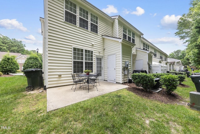 4413 Sugarbend Way, Raleigh, NC 27606 - back of house featuring a patio area and a yard