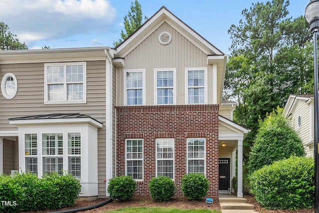 4413 Sugarbend Way, Raleigh, NC 27606 - view of front facade featuring brick siding
