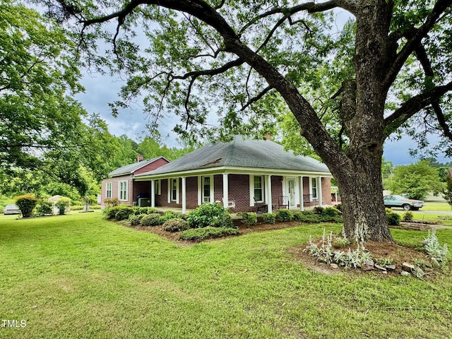 410 High St, Norlina, NC 27563 - view of front of property featuring a front lawn and brick siding