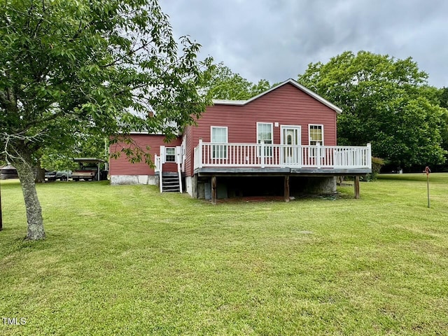 410 High St, Norlina, NC 27563 - rear view of house with a wooden deck and a yard