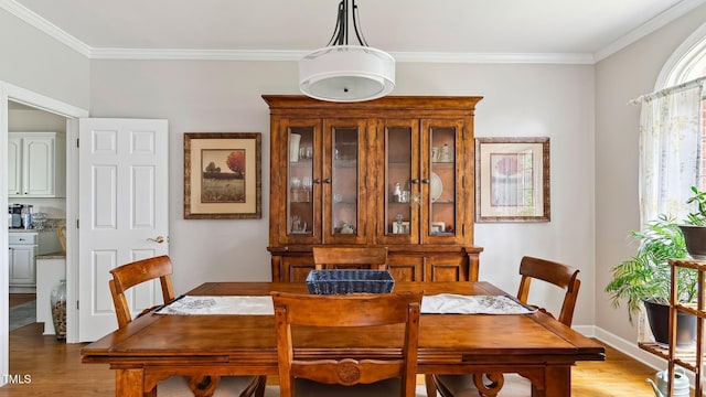 5 Wake Forest Ct, Southern Pines, NC 28387 - dining room with light wood finished floors and crown molding