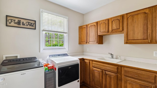 5 Wake Forest Ct, Southern Pines, NC 28387 - laundry area featuring washing machine and dryer and cabinet space