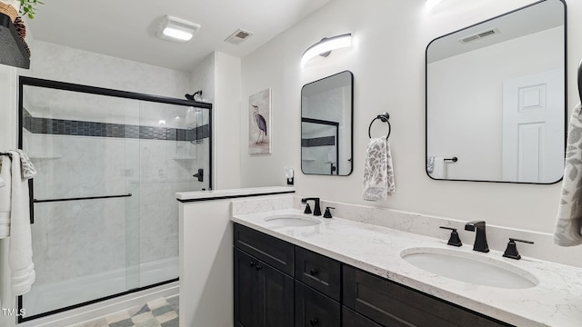 5 Wake Forest Ct, Southern Pines, NC 28387 - bathroom featuring a stall shower and double vanity