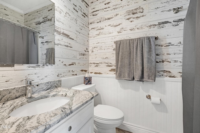 5013 Wheatridge Dr, Fuquay Varina, NC 27526 - bathroom with vanity, a wainscoted wall, ornamental molding, and a shower with curtain