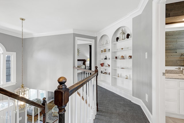 5013 Wheatridge Dr, Fuquay Varina, NC 27526 - hallway with built in features, ornamental molding, and an upstairs landing