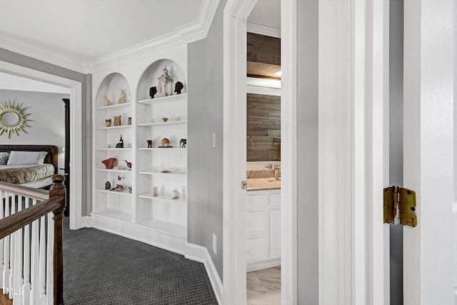 5013 Wheatridge Dr, Fuquay Varina, NC 27526 - hall with crown molding, built in shelves, and carpet flooring
