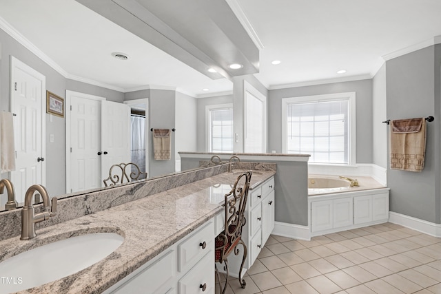 5013 Wheatridge Dr, Fuquay Varina, NC 27526 - full bath with double vanity, a garden tub, tile patterned floors, ornamental molding, and recessed lighting