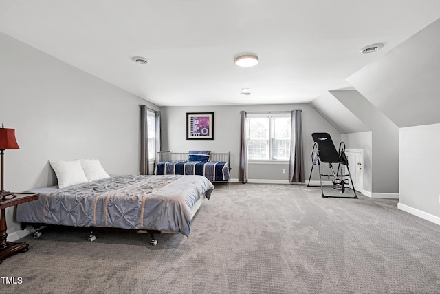 5013 Wheatridge Dr, Fuquay Varina, NC 27526 - carpeted bedroom featuring baseboards and vaulted ceiling