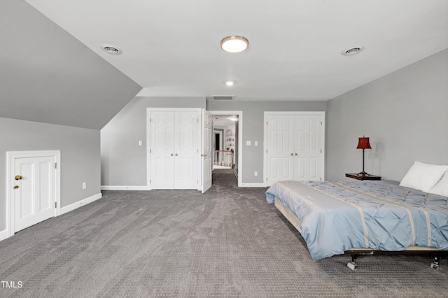 5013 Wheatridge Dr, Fuquay Varina, NC 27526 - carpeted bedroom featuring multiple closets and baseboards