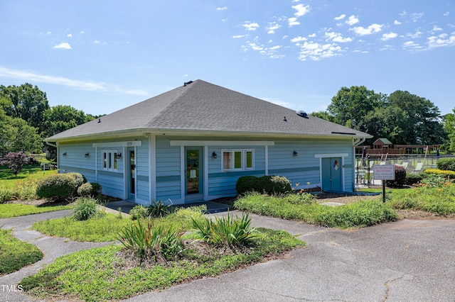 5013 Wheatridge Dr, Fuquay Varina, NC 27526 - view of side of home featuring roof with shingles
