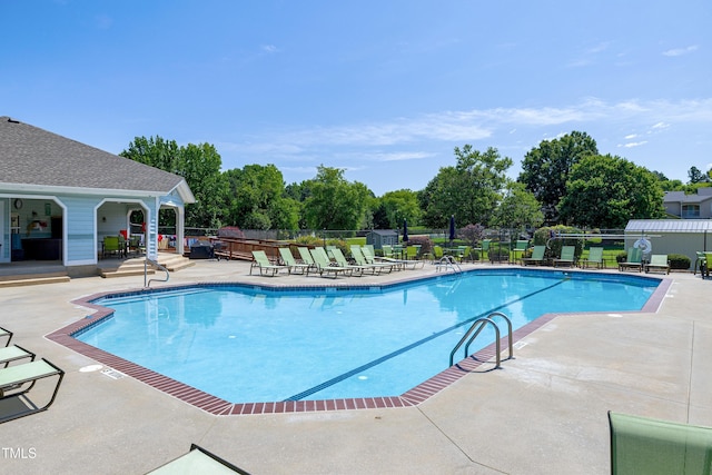 5013 Wheatridge Dr, Fuquay Varina, NC 27526 - community pool with a patio