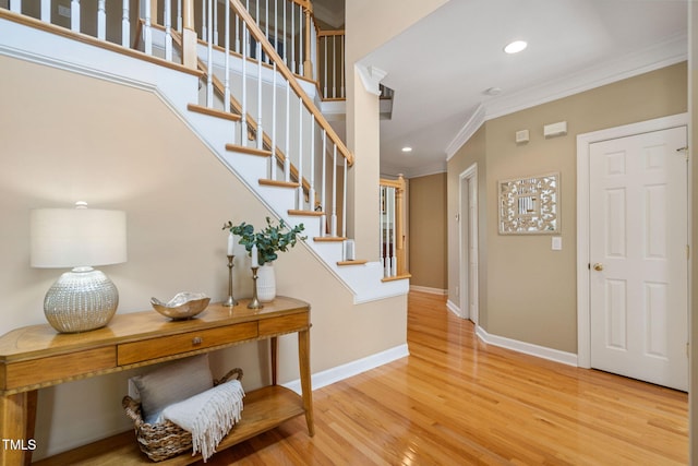315 Birdwood Ct, Cary, NC 27519 - staircase with crown molding, wood finished floors, and recessed lighting