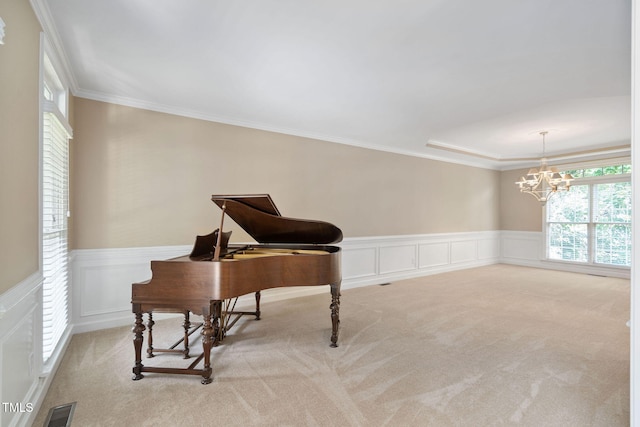 315 Birdwood Ct, Cary, NC 27519 - sitting room with healthy amount of natural light, light colored carpet, a chandelier, a wainscoted wall, and an office area