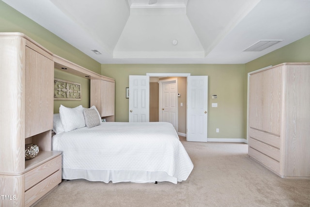315 Birdwood Ct, Cary, NC 27519 - bedroom featuring a tray ceiling and light carpet