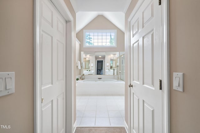 315 Birdwood Ct, Cary, NC 27519 - bathroom with lofted ceiling and tile patterned floors